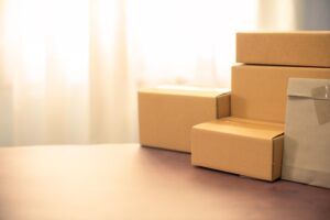 lot-brown-cardboard-boxes-copy-space-table-warehouse-delivery-service-shipment-goods_254717-1128